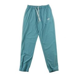 Second life - Nike spodnie dresowe męskie tapered fit - Stan dobry. Niebieskie spodnie sportowe męskie Nike, z dresówki. Za 106.46 zł.