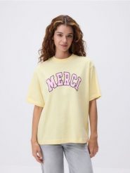 T-shirt oversize z nadrukiem - jasnożółty. Żółte t-shirty damskie Reserved, l, bez wzorów, z bawełny, bez kołnierzyka. W wyprzedaży za 45.99 zł.
