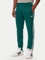 Adidas Spodnie dresowe Beckenbauer KE1668 Zielony ciemny Regular Fit. Zielone spodnie dresowe męskie Adidas, bez wzorów, z dresówki. Za 237.99 zł.