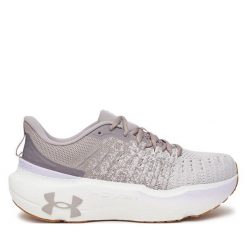 Buty do biegania Under Armour. Szare obuwie do biegania damskie Under Armour. Za 439.99 zł.