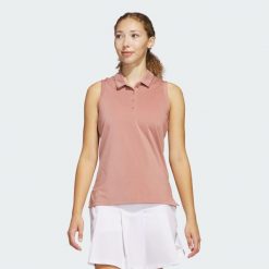 Koszulka Women's Ultimate365 Solid Sleeveless Polo. Czerwone bluzki damskie Adidas, m, bez wzorów, z materiału, sportowe, bez kołnierzyka, bez ramiączek. W wyprzedaży za 154.10 zł.