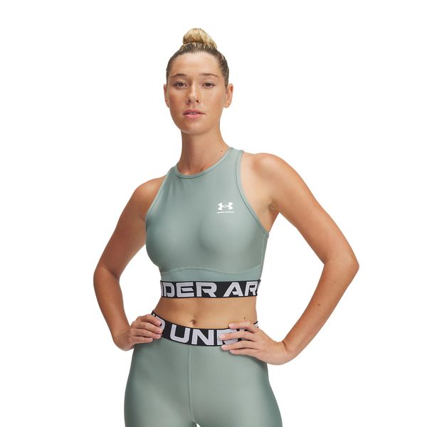 Top treningowy damski Under Armour Heat Gear Rib Tank. Zielone topy damskie Under Armour, s, bez wzorów, bez kołnierzyka. Za 79.99 zł.