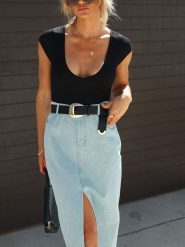 Milan Kiss Koszulka w kolorze czarnym rozmiar: M. Czarne bluzki damskie Milan Kiss, m, bez wzorów, bez kołnierzyka. Za 113.99 zł.