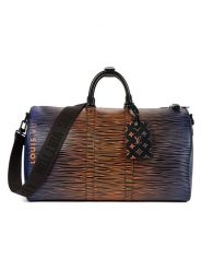 Louis Vuitton Skórzana torba podróżna w kolorze niebiesko-pomarańczowym - 50 x 28 x 23 cm rozmiar: onesize. Niebieskie torebki klasyczne damskie Louis Vuitton, bez wzorów, z materiału, bez dodatków. Za 17,086.99 zł.