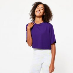 Koszulka damska Domyos Gym & Pilates crop top. Niebieskie bluzki damskie DOMYOS, m, bez wzorów, z bawełny, bez ramiączek. Za 49.99 zł.