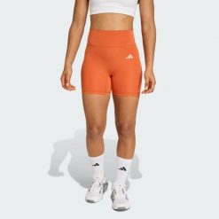 Krótkie legginsy Optime Essentials Workout. Brązowe legginsy damskie Adidas, bez wzorów. Za 179.00 zł.