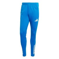 Spodnie dresowe Real Madrid EU 2025/26. Niebieskie spodnie sportowe męskie Adidas, z dresówki. Za 272.00 zł.