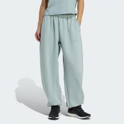 Spodnie Soft Lux Loose. Zielone spodnie sportowe damskie Adidas, l, z bawełny, na fitness i siłownię. Za 319.50 zł.
