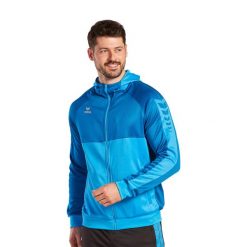 Kurtka treningowa z kapturem Erima Six Wings. Niebieskie kurtki męskie Erima, bez wzorów, eleganckie, z kapturem. W wyprzedaży za 223.00 zł.