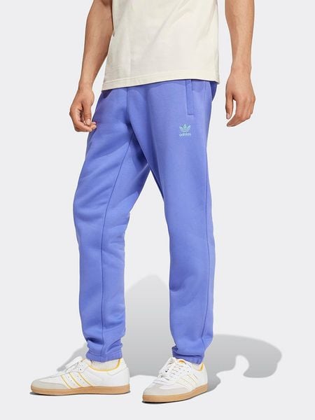 Adidas Spodnie dresowe w kolorze niebieskim rozmiar: S. Niebieskie spodnie dresowe męskie Adidas, bez wzorów, z dresówki. Za 148.61 zł.