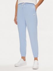Tommy Jeans Spodnie dresowe Script DW0DW17771 Błękitny Relaxed Fit. Niebieskie jeansy damskie Tommy Jeans, l, bez wzorów, z dresówki. Za 469.99 zł.