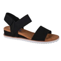 Sandały Skechers Model Desert Kiss Kolor Czarny. Czarne sandały damskie Skechers, bez wzorów, z tkaniny, bez obcasa. Za 199.99 zł.