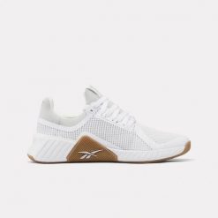 Damskie buty treningowe Reebok FLIP CHARGE 100272303 białe. Białe obuwie treningowe damskie Reebok, na fitness i siłownię. Za 209.00 zł.