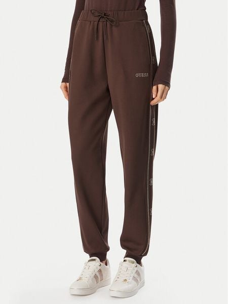 Guess Spodnie dresowe V5BB23 KCX22 Brązowy Regular Fit. Brązowe spodnie dresowe damskie Guess, xs, z aplikacjami, z dresówki. Za 474.99 zł.