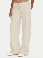 Guess Jeans Spodnie dresowe W5BB04 KC811 Beżowy Wide Leg. Brązowe jeansy damskie Guess Jeans, xxl, z aplikacjami, z bawełny. Za 349.99 zł.