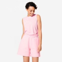 Koszulka fitness damska bez rękawów. Czerwone bluzki sportowe damskie Decathlon, xs, z elastanu, bez kołnierzyka, bez ramiączek. Za 84.99 zł.