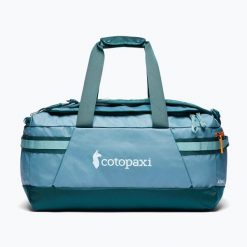 Torba podróżna Cotopaxi Allpa Duffel. Niebieskie torby podróżne damskie Cotopaxi, bez wzorów, bez dodatków. Za 839.99 zł.
