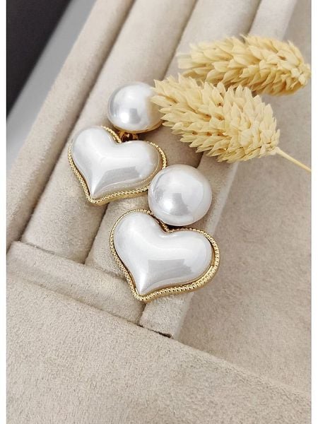 Nakkash Pozłacane kolczyki-wkrętki rozmiar: onesize. Żółte kolczyki damskie Nakkash, z perłą, pozłacane. Za 39.45 zł.