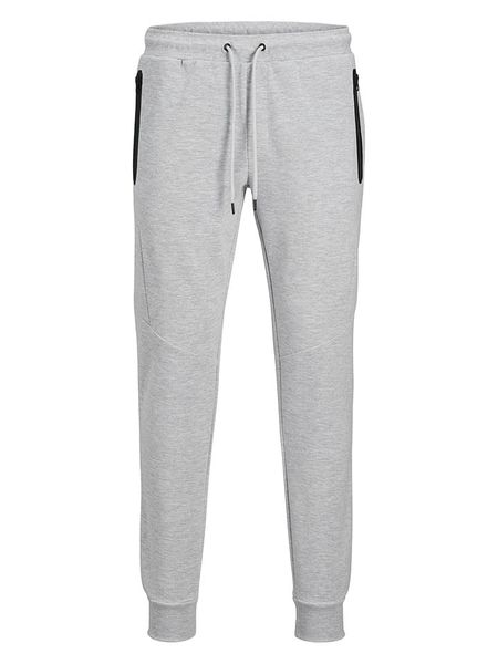 Jack & Jones Spodnie dresowe "Will" w kolorze jasnoszarym rozmiar: L. Szare spodnie dresowe męskie Jack & Jones, bez wzorów, z dresówki. Za 114.17 zł.