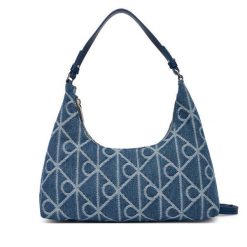 Torebka Calvin Klein. Niebieskie torebki klasyczne damskie CALVIN KLEIN, bez wzorów, z denimu, bez dodatków. Za 489.99 zł.
