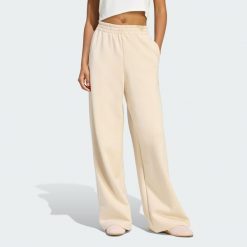 Spodnie Soft Lux Straight Leg. Białe spodnie dresowe damskie Adidas, bez wzorów. Za 299.00 zł.