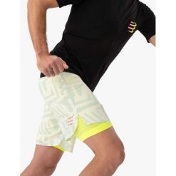 Spodenki do biegania 2w1 męskie Compressport Trail Racing 2-in-1 Short. Niebieskie szorty męskie Compressport, bez kołnierzyka. Za 361.99 zł.