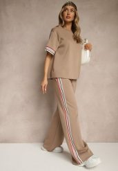 Beżowy Komplet z Wiskozą Bluzka Ozdobiona Paskami i Szerokie Spodnie Nilassea. Brązowe spodnie materiałowe damskie Renee, bez wzorów, z wiskozy, eleganckie. Za 139.99 zł.