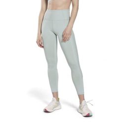 Damskie legginsy z wysokim stanem w prążki Reebok. Niebieskie legginsy damskie Reebok, xs, bez wzorów, z dzianiny. Za 273.35 zł.