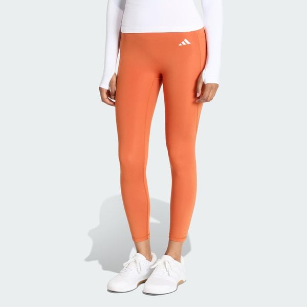 Legginsy Optimé Essentials No Front Rise Seam 7/8. Brązowe legginsy damskie Adidas, bez wzorów. Za 219.00 zł.