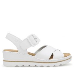 Sandały Rieker. Białe sandały damskie Rieker, bez wzorów, bez obcasa, na koturnie. Za 299.99 zł.
