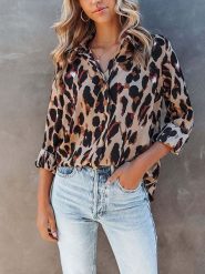 Milan Kiss Bluzka w kolorze jasnobrązowo-czarnym rozmiar: XL. Brązowe bluzki damskie Milan Kiss, xl, bez wzorów, bez kołnierzyka, bez ramiączek. Za 126.15 zł.