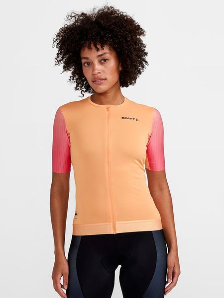 Craft Koszulka kolarska "ADV Aero Jersey" w kolorze pomarańczowym rozmiar: L. Pomarańczowe bluzki sportowe damskie Craft, l, z jersey, bez kołnierzyka, bez ramiączek. Za 174.95 zł.