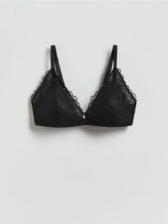 Koronkowy biustonosz z fiszbinami - czarny. Czarne biustonosze Reserved, bez wzorów, z koronki. Za 69.99 zł.