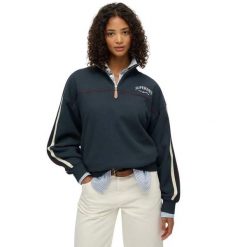 Sweter z kołnierzem tunezyjskim damski Superdry Country Club Tape. Niebieskie swetry klasyczne damskie Superdry., na zimę, bez kołnierzyka. Za 346.45 zł.