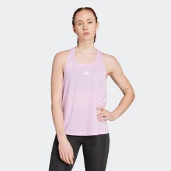 Koszulka fitness damska ADIDAS bez rękawów. Czerwone bluzki sportowe damskie Adidas, l, bez wzorów, z materiału, bez ramiączek. Za 99.99 zł.