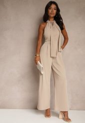 Beżowy Kombinezon Wide Leg z Ozdobnym Wiązaniem przy Szyi Silelia. Brązowe kombinezony damskie Renee, l, bez wzorów, eleganckie, bez kołnierzyka, bez ramiączek. Za 99.99 zł.