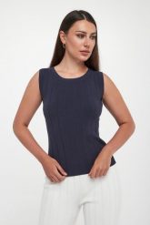 Top damski dzianinowy Valido MM. Topy damskie MM, l, bez wzorów, z dzianiny, bez kołnierzyka. W wyprzedaży za 389.40 zł.
