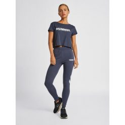 Damska koszulka crop top Hummel Legacy. Niebieskie bluzki damskie HUMMEL, m, bez wzorów, bez kołnierzyka. Za 91.50 zł.