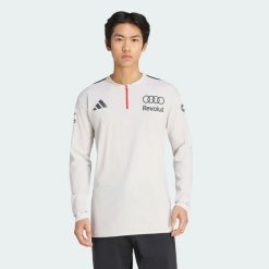 KOSZULKA POLO Z DŁUGIM RĘKAWEM AUDI REVOLUT F1 TEAM ENGINEERS & MARKETING. Białe koszulki polo męskie Adidas, l, bez wzorów, z dzianiny, bez ramiączek. Za 399.00 zł.