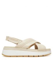 Clarks Sandały Tuscan Cross 26181470 Écru. Sandały damskie Clarks, bez wzorów, ze skóry, bez obcasa, na płaskiej podeszwie. Za 449.99 zł.