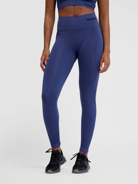 Damskie legginsy bezszwowe z wysoką talią Hummel TIF. Niebieskie legginsy damskie HUMMEL, s, bez wzorów, z materiału, z podwyższonym stanem, na fitness i siłownię. Za 126.50 zł.