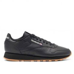 Buty do chodzenia męskie Reebok Classic Leather. Czarne buty sportowe na co dzień męskie Reebok, z gumy, bez zapięcia, trekkingowe, reebok classic. Za 369.00 zł.