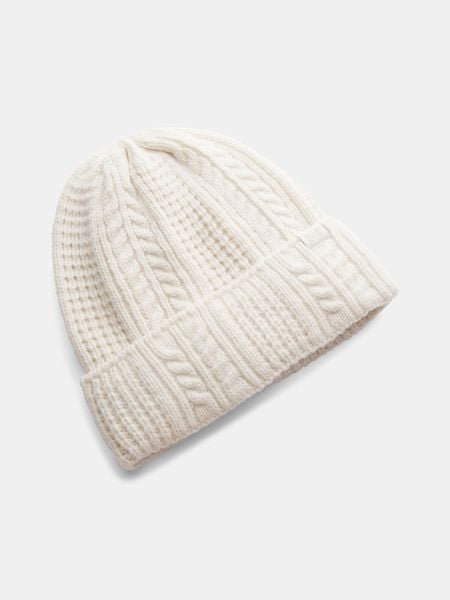Czapka Under Armour Halftime beżowa dla kobiet. Brązowe czapki z daszkiem damskie Under Armour, bez wzorów, z dzianiny. Za 167.25 zł.