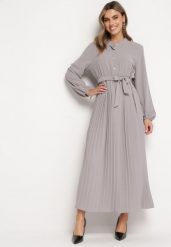 Ciemnoszara Rozkloszowana Sukienka Maxi z Plisowanym Dołem i Wiązanym Paskiem Nollira. Szare sukienki damskie Born2be, bez wzorów, eleganckie, bez kołnierzyka, bez ramiączek, maxi, plisowane. W wyprzedaży za 111.99 zł.
