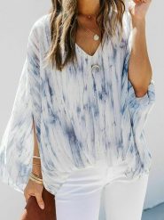 Milan Kiss Bluzka w kolorze biało-szarym rozmiar: S. Białe bluzki damskie Milan Kiss, s, bez wzorów, bez kołnierzyka, bez ramiączek. Za 114.17 zł.