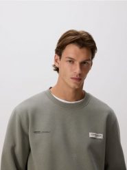 Bluza z naszywką - jasny zielony. Zielone bluzy bez kaptura męskie Reserved, l, z bawełny. Za 119.99 zł.