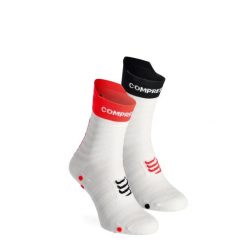 Skarpety biegowe Compressport Pro Racing v4.0 UL Run High. Niebieskie skarpetki damskie Compressport, bez wzorów. Za 78.99 zł.