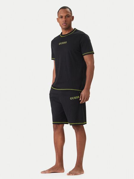 Guess Piżama U6GX03 KCAM1 Czarny Regular Fit. Czarne piżamy męskie Guess, m, z aplikacjami, z bawełny, bez ramiączek. Za 264.99 zł.