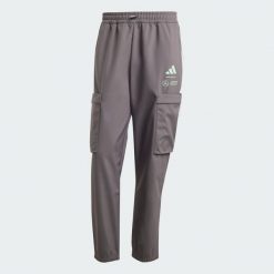 Spodnie Mercedes - Amg Petronas Formula One Team Premium Woven. Fioletowe spodnie materiałowe męskie Adidas, bez wzorów, z materiału. Za 479.00 zł.