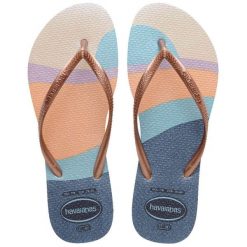 Japonki damskie Havaianas Slim Palette Glow. Brązowe klapki damskie Havaianas, bez wzorów, z materiału, bez obcasa. Za 99.99 zł.